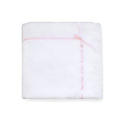 Carriage Boutique Julius Berger white knit baby blanket with delicate pink satin ribbon trim and a sweet bow accent.