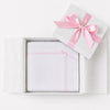 Carriage Boutique Julius Berger white knit baby blanket with pink satin ribbon trim and bow in a gift box