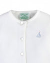 Carriage Boutique Julius Berger white cotton baby cardigan with a small embroidered sailboat motif and button front.