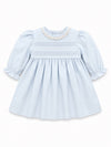 Carriage Boutique light blue cotton baby girl dress with lace collar, hand-embroidered pin-tucks, and puffy sleeves.
