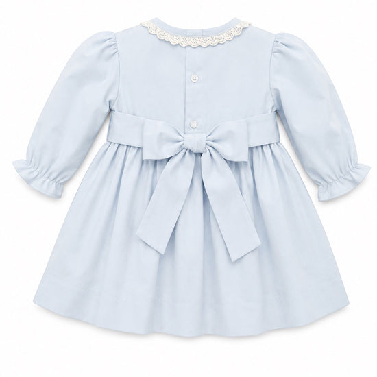 Carriage Boutique light blue cotton baby dress with lace collar, puffy sleeves, and a back sash bow.