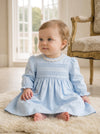 Carriage Boutique baby girl light blue cotton dress with long puffy sleeves, lace collar, and hand-embroidered detail