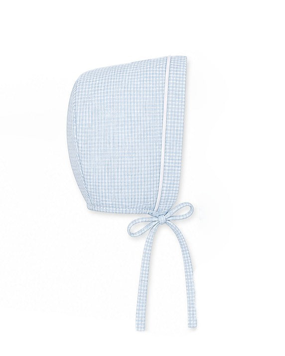 Carriage Boutique light blue gingham baby bonnet with white piping and tie closure.