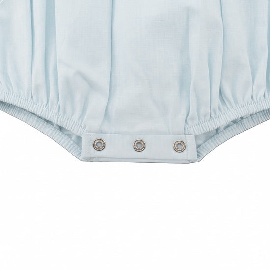 Carriage Boutique light blue cotton bubble romper with smocked sailboat detail and snap closures.