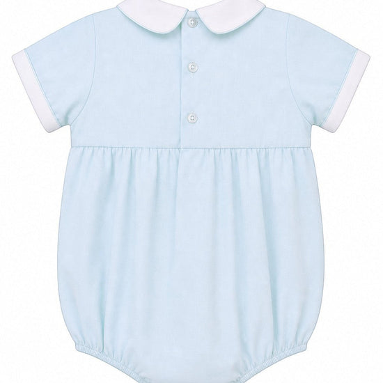 Carriage Boutique light blue cotton bubble romper with white collar and piped cuffs, featuring smocking with sailboats and lighthouse.