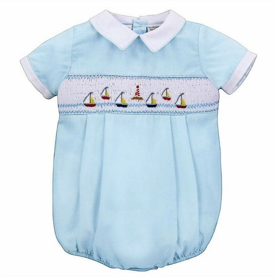 Carriage Boutique light blue cotton bubble romper with smocked chest featuring embroidered sailboats and lighthouse, white collar and cuffs.