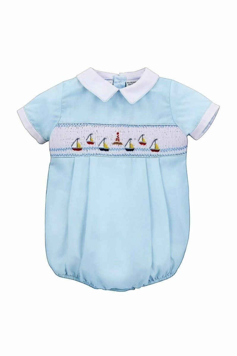 Carriage Boutique light blue cotton bubble romper with smocked chest featuring embroidered sailboats and lighthouse, white collar and cuffs.