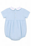 Carriage Boutique light blue bubble romper with white Peter Pan collar and smocked carousel horse detail.
