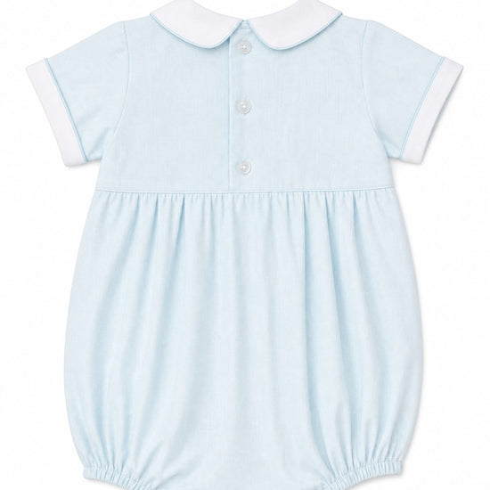 Carriage Boutique light blue bubble romper with Peter Pan collar, white piping, and smocking with a train motif.