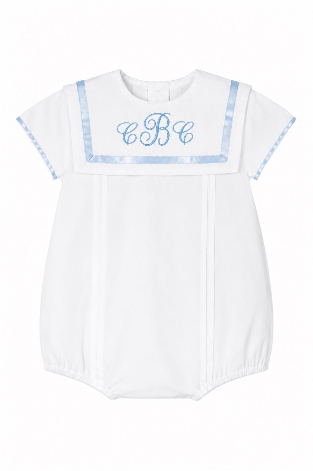 Carriage Boutique white baby boy bubble romper with blue monogram, Peter Pan collar, and elasticized leg openings.