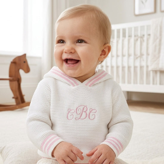 Carriage Boutique baby girl white hooded sweater with pink striped trim and custom monogram on the chest