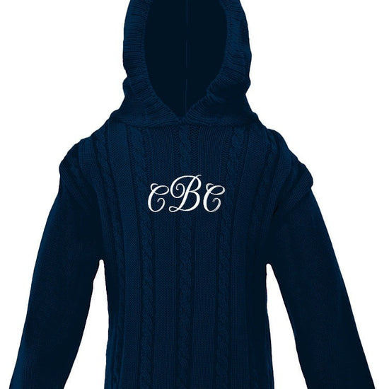 Carriage Boutique navy cable knit baby sweater with a hood and white monogram embroidery on the chest