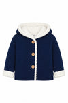 Carriage Boutique navy knit cotton baby jacket with a white sherpa-lined hood, cuffs, and three front wooden buttons.