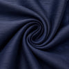 Close-up of navy blue poly silk fabric with a subtle textured weave from Carriage Boutique