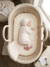 Carriage Boutique newborn set in cream knit with blush pink stripes, including a long-sleeve top, leggings, and hat.