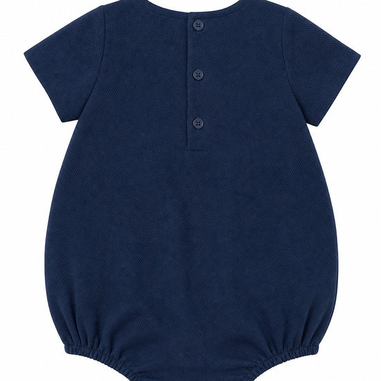 Carriage Boutique navy blue bubble romper with short sleeves and Peter Pan collar embroidered with Noah's Ark scene.