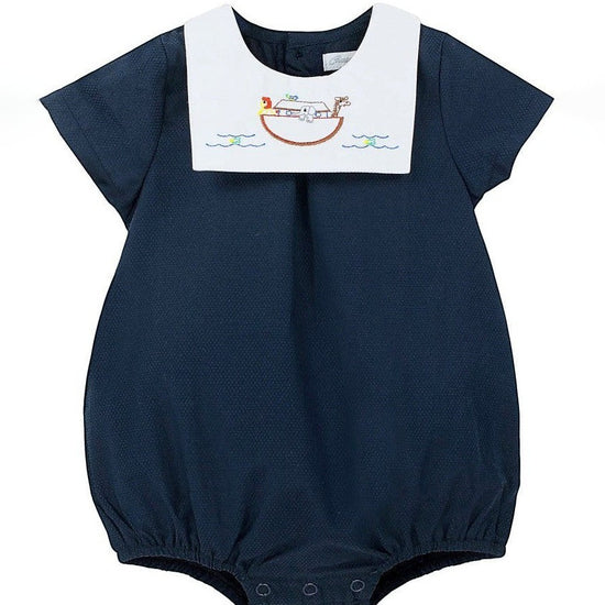 Carriage Boutique navy blue bubble romper with white Peter Pan collar embroidered with Noah's Ark and animals.