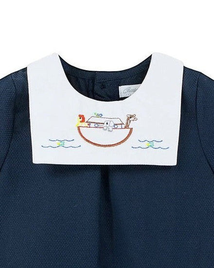 Carriage Boutique navy blue bubble romper with white Peter Pan collar embroidered with Noah's Ark and animals.