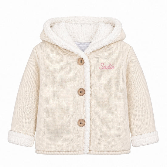 Carriage Boutique off-white knit cotton baby jacket with sherpa lining, hood, and three front buttons.