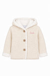 Carriage Boutique off-white knit cotton baby jacket with sherpa lining, hood, and three front buttons.