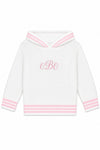 Carriage Boutique white knit baby girl sweater with pink striped hood and cuffs and personalized monogram embroidery
