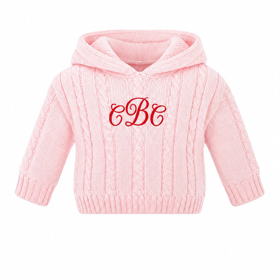 Carriage Boutique personalized pink cable knit baby sweater with a hood and red monogram embroidery on the chest
