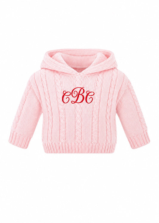 Carriage Boutique personalized pink cable knit baby sweater with a hood and red monogram embroidery on the chest