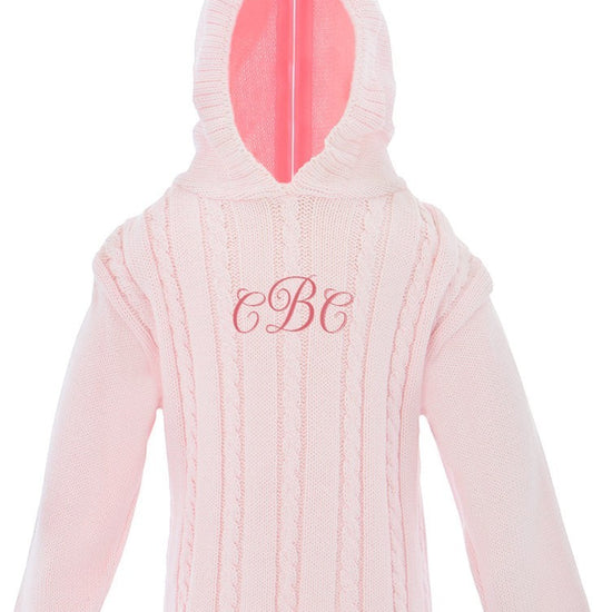 Carriage Boutique pink cable knit cotton baby sweater with a hood and personalized monogram embroidery on the chest.
