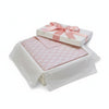 Carriage Boutique pink cotton baby blanket with knit logo pattern in a white gift box with a satin ribbon