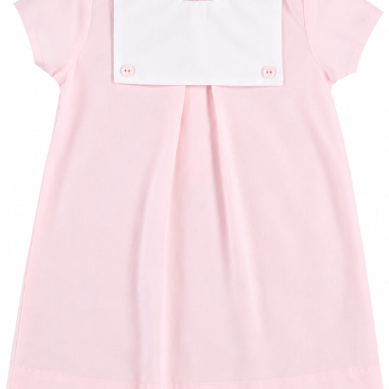 Carriage Boutique personalized baby girl dress in light pink cotton with a white button bib and short sleeves.