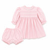 Carriage Boutique light pink cotton baby dress with lace collar, hand embroidery, and matching ruffled bloomers.