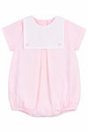 Carriage Boutique baby girl bubble romper in light pink cotton with a white button bib and short sleeves.