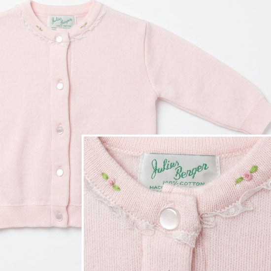 Carriage Boutique pink cotton cardigan for girls featuring delicate embroidered rosebuds and a lace-trimmed crew neck.