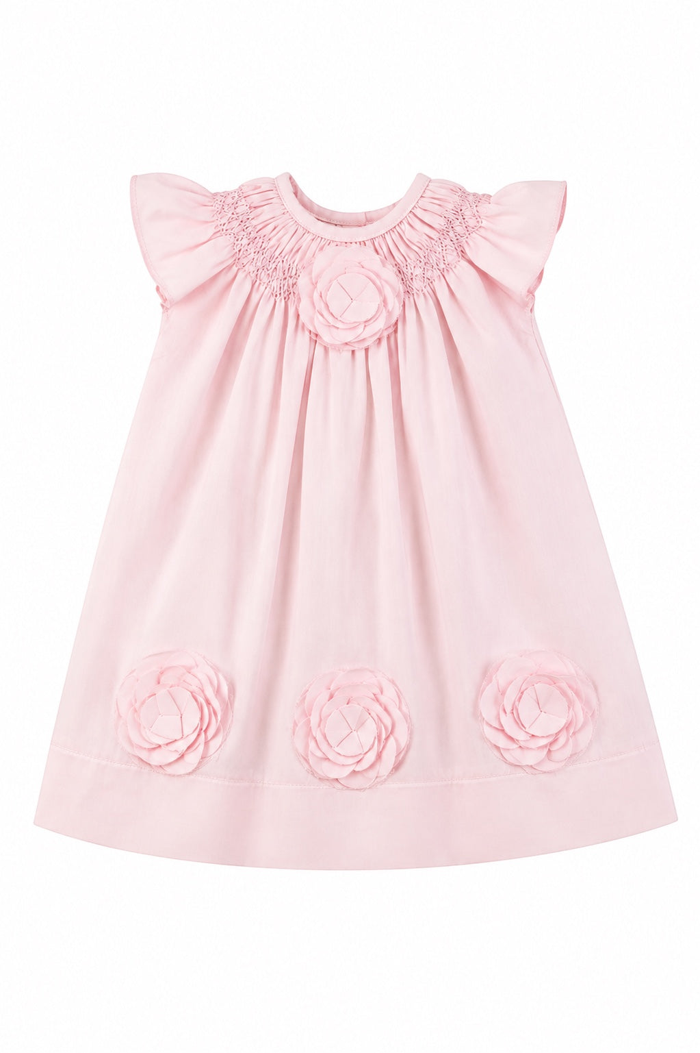 Carriage Boutique baby girl dress in classic pink featuring delicate cut-out flower appliqués and smocked neckline.