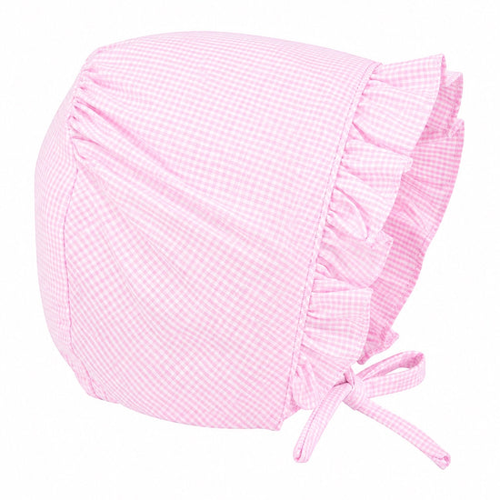 Carriage Boutique pink gingham baby bonnet with ruffled trim and tie closure, made from soft cotton.
