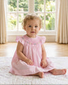Carriage Boutique pink gingham baby girl bishop dress with flutter sleeves and hand-embroidered floral smocking