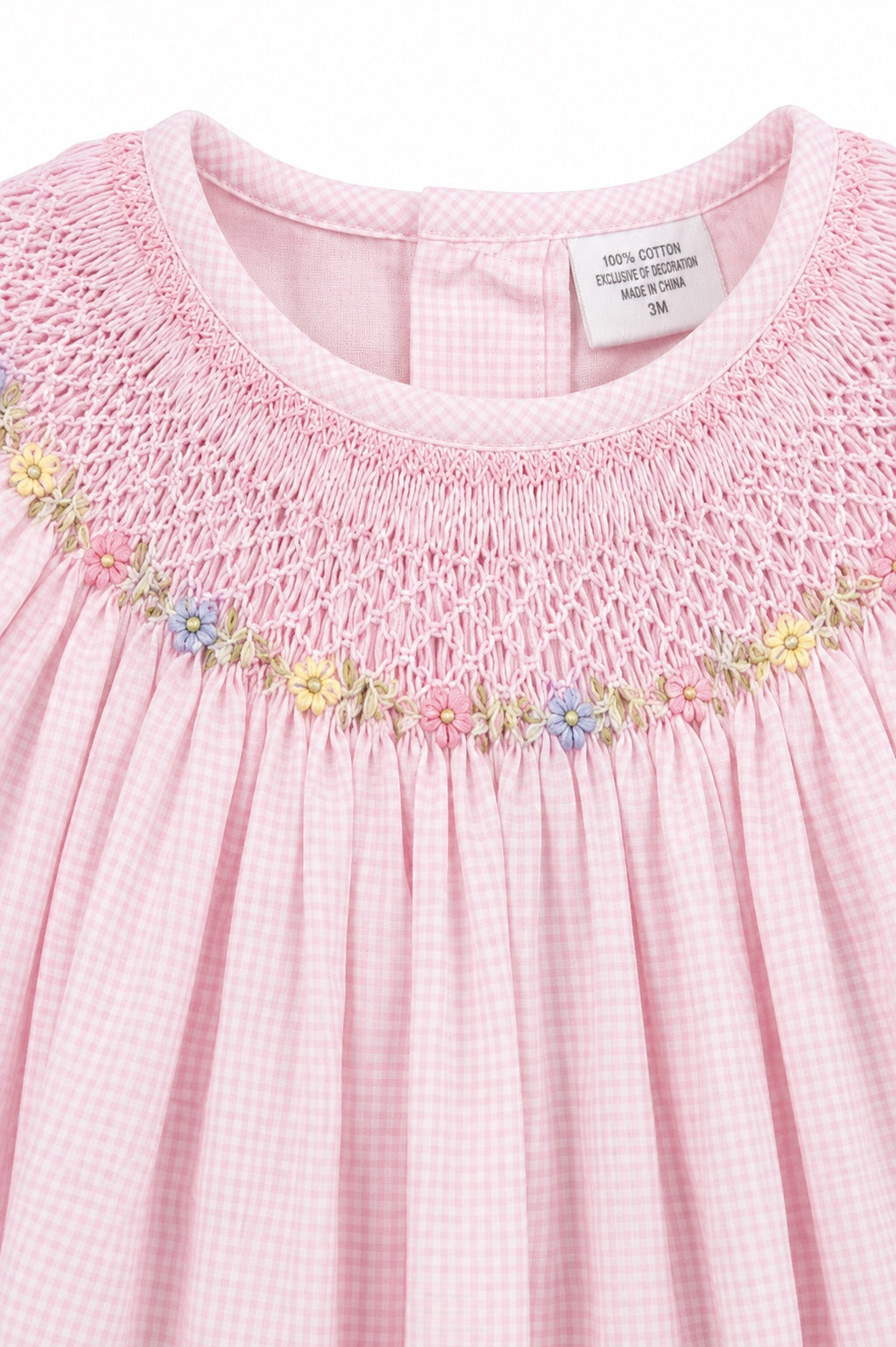 Carriage Boutique pink gingham baby girl bishop dress with hand-embroidered floral smocking and flutter sleeves