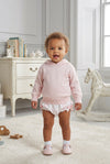 Carriage Boutique baby girl wearing a soft pastel pink cotton knit hooded sweater with white ruffled bloomers