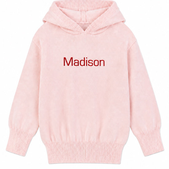 Carriage Boutique baby girl pink knit hoodie with Madison embroidered in red on the chest and ribbed trim