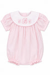Carriage Boutique light pink cotton baby girl bubble romper with a white Peter Pan collar and custom monogram detail.