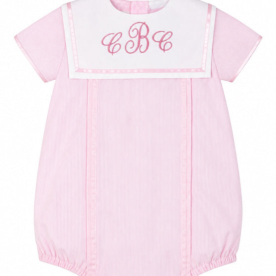 Carriage Boutique pink pinstripe baby bubble romper with a white Peter Pan collar and custom monogram embroidery.