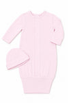 Carriage Boutique pink newborn sleep sack with matching hat, long sleeves, and scalloped trim on a white background.