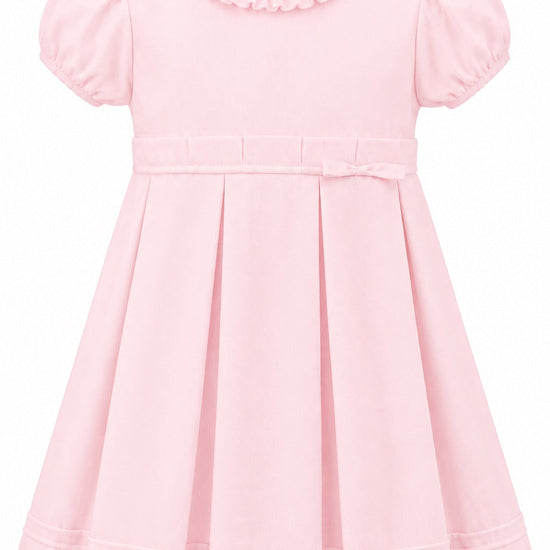 Carriage Boutique baby and toddler girl dress in soft pink pique fabric with a ruffled collar and pleated skirt.