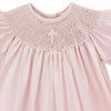 Carriage Boutique pink hand-smocked bishop dress with pearl cross detail and matching bonnet. 100% cotton.