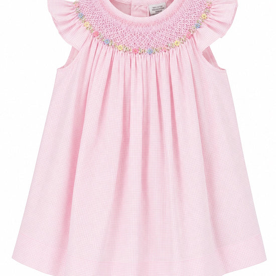 Carriage Boutique pink baby girl bishop dress with flutter sleeves and hand-embroidered floral smocking details.