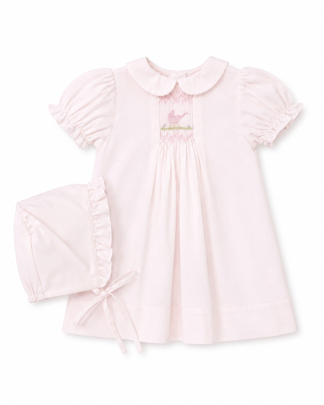 Carriage Boutique pale pink smocked heirloom dress with bird embroidery, Peter Pan collar, and matching ruffled bonnet.