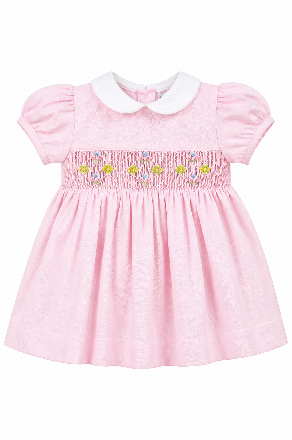 Carriage Boutique baby girl pink pique dress with white peter pan collar and hand smocked floral waist detail