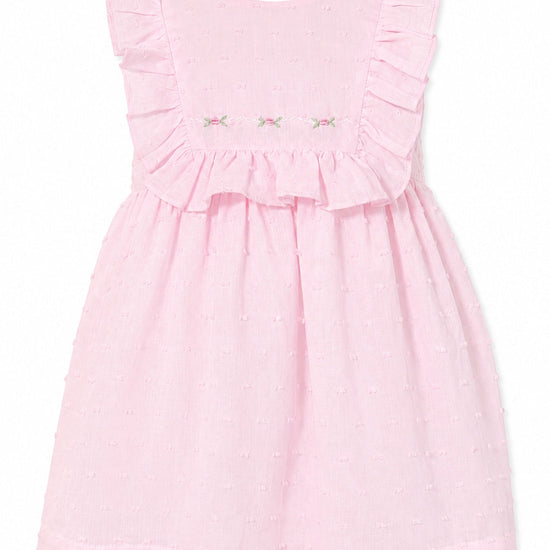 Carriage Boutique pink Swiss dot baby girl dress with ruffled sleeves and delicate floral embroidery on the bodice.