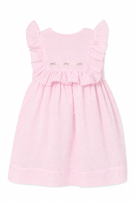 Carriage Boutique pink Swiss dot baby girl dress with ruffled sleeves and delicate floral embroidery on the bodice.