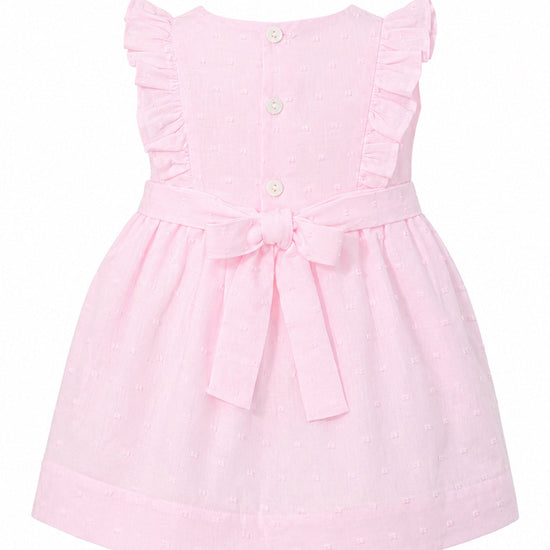 Carriage Boutique baby girl pink Swiss dot dress with ruffled sleeves and a back waist bow detail